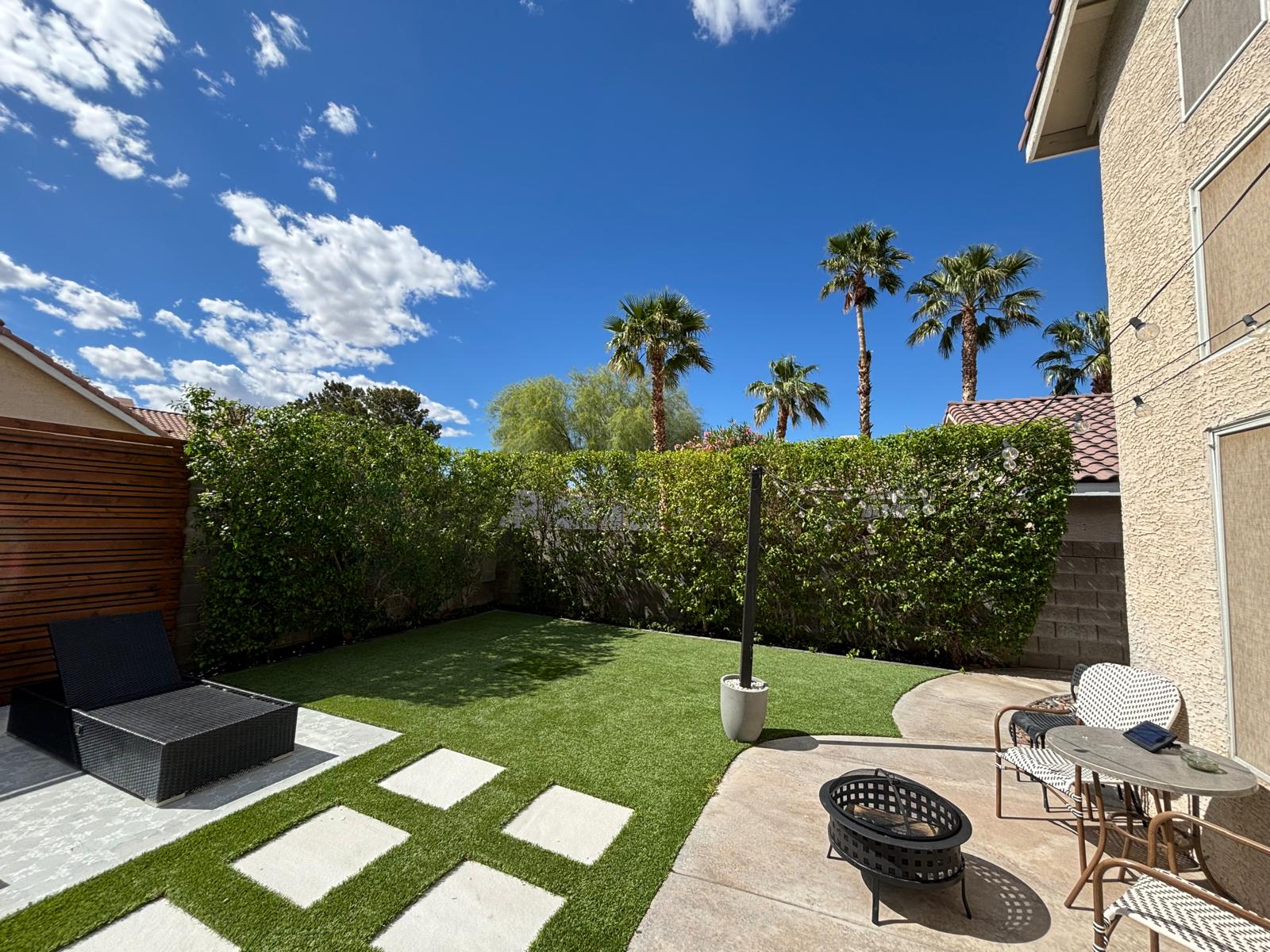 Artificial grass with garden beds